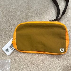 Brand new with tag
Exclusive OG 
Lululemon Everywhere Belt Bag GLSC/CLNT
